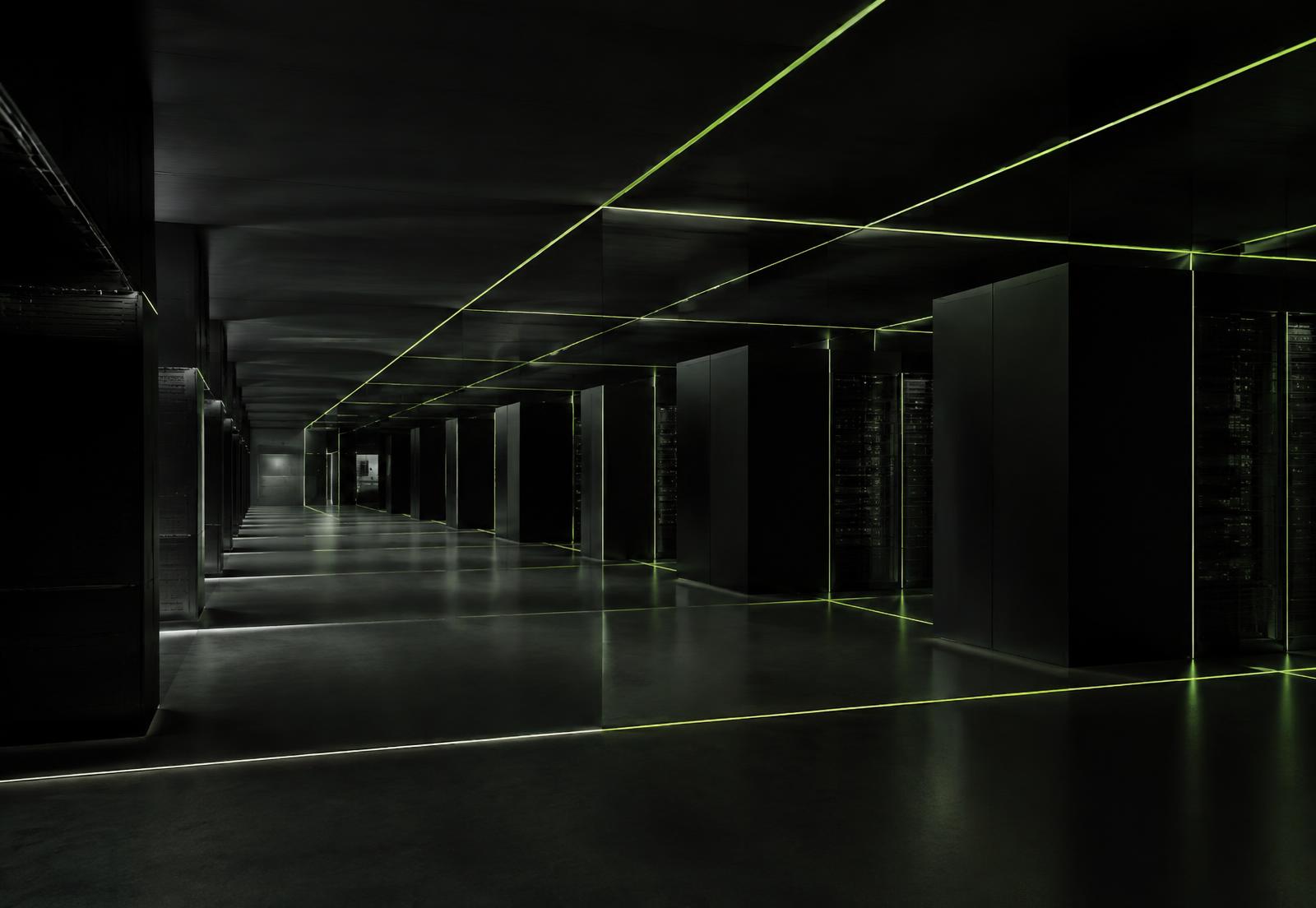 Dark, minimal server hall with thin lime light lines tracing a geometric grid across ceiling and floor